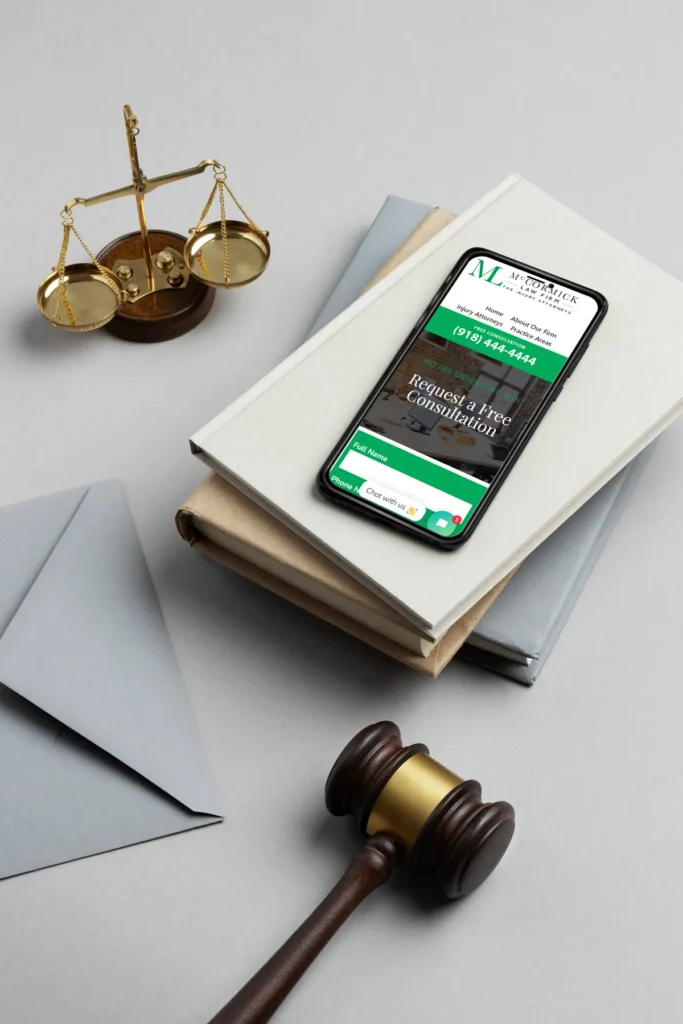 Contact us image, with McCormick Law Firm website on phone